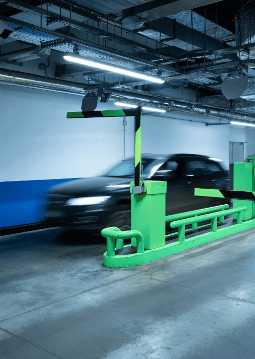 Car passing through the parking lot barrier