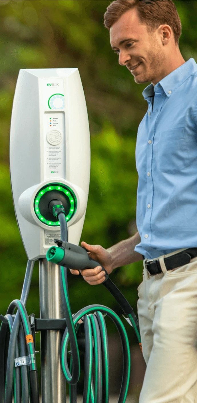 Man using the EV Charger